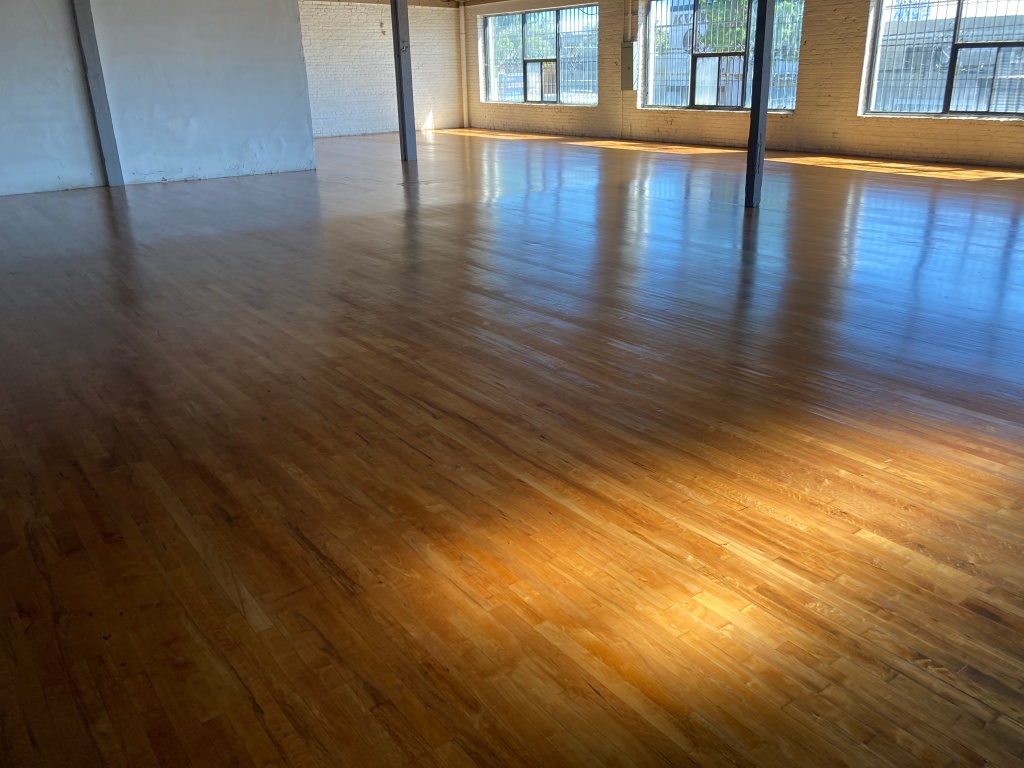 Newly finished oak floors at WCFC on Venice & Valencia